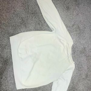 Girls white sweater. From champion. Size L.